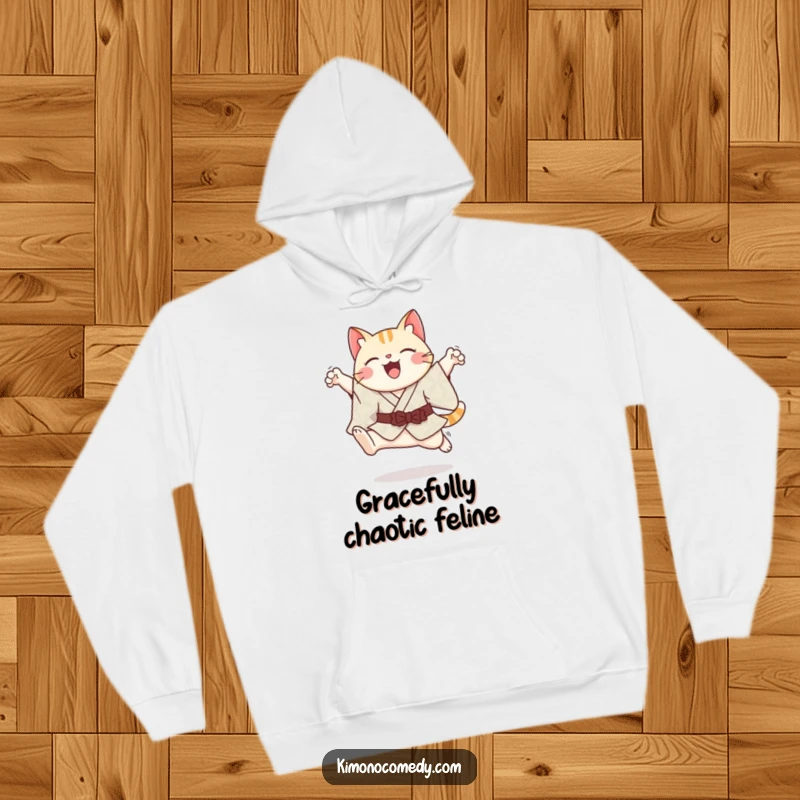 Funny cheerful kawaii cat in a patterned kimono, executing a graceful leap, on a soft, warm hoodie.