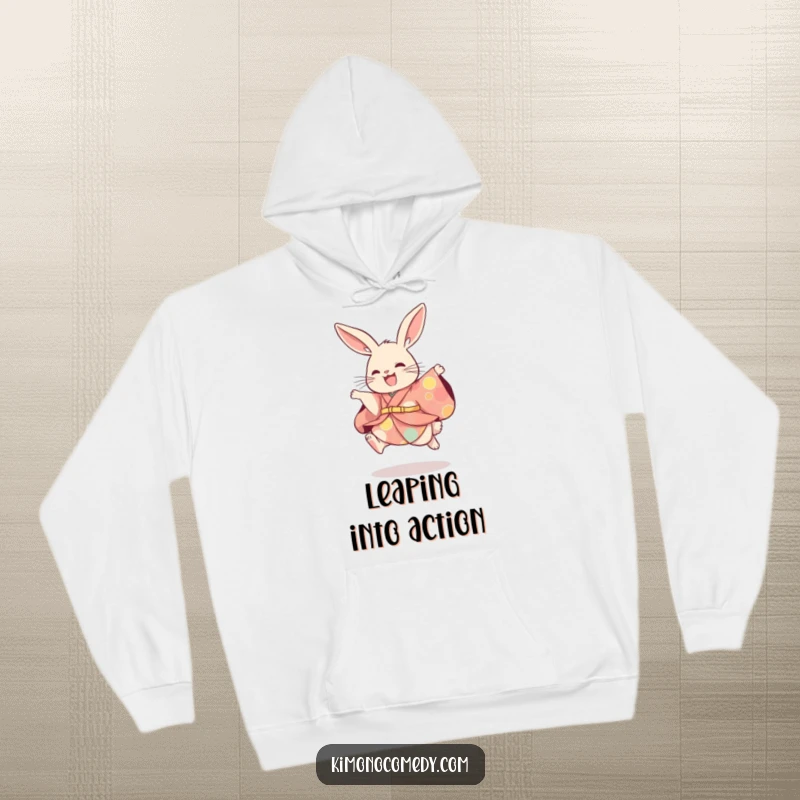 Funny rabbit in a festive kimono, captured mid-air during a playful leap. A warm and humorous hoodie design.