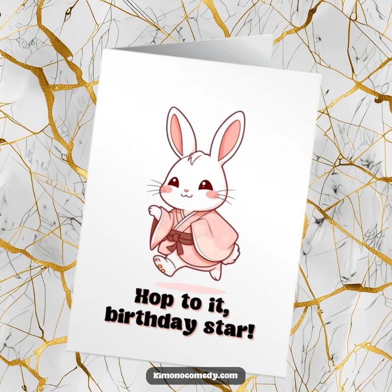 Funny Free Printable birthday card: an ecstatic rabbit in a fancy kimono hopping with pure delight.