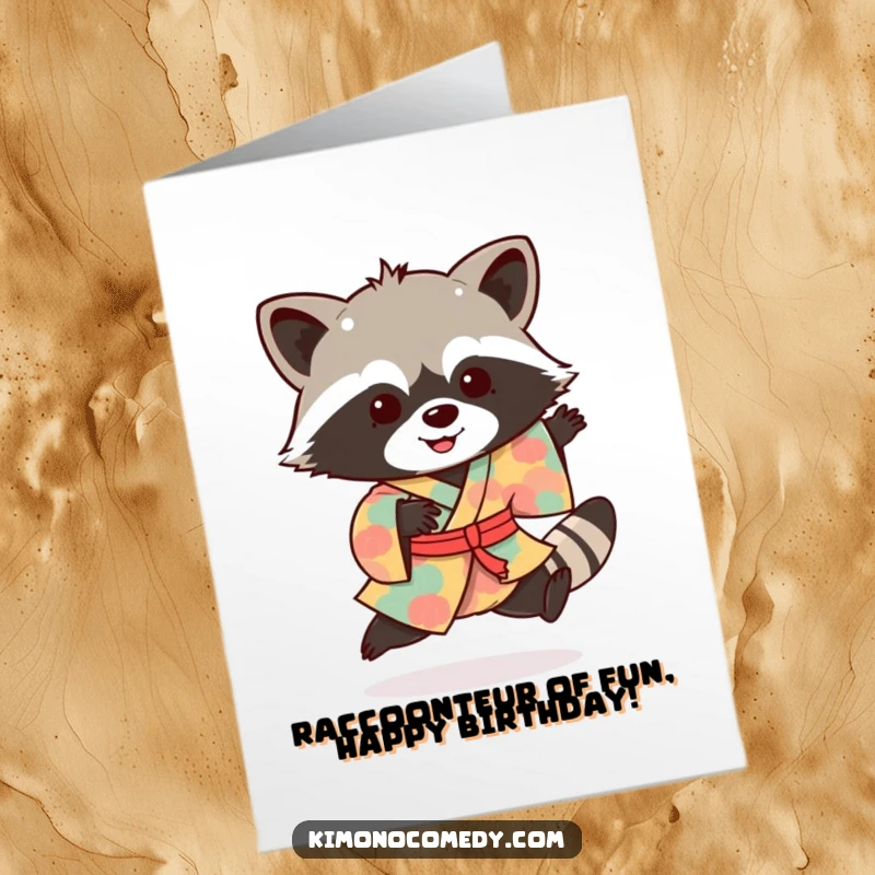 Funny Free Printable Birthday Card: A playful raccoon in a vibrant kimono does a joyful hop, celebrating the occasion.