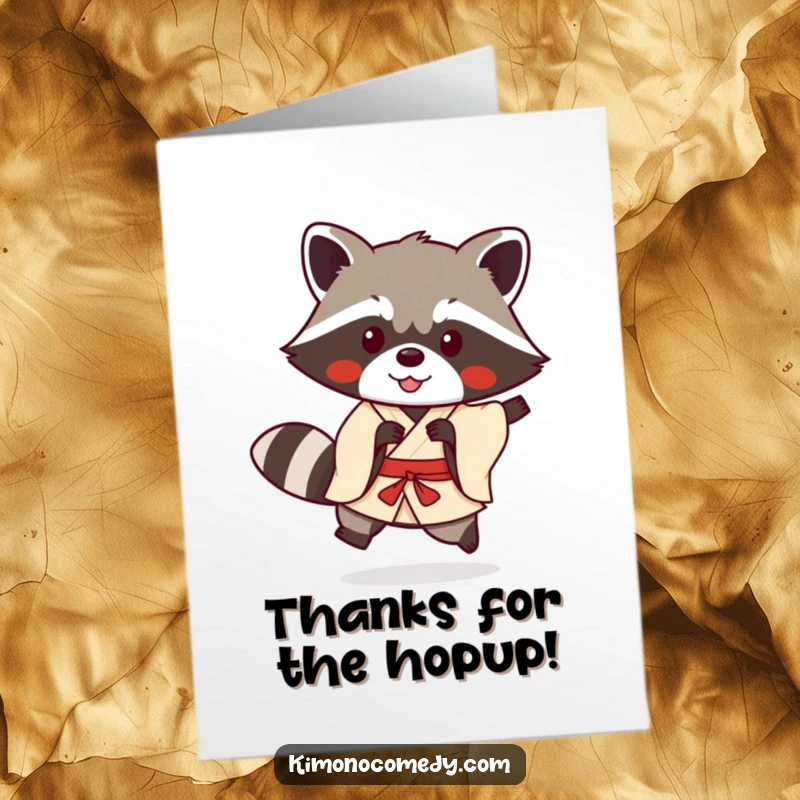 Funny free printable thank you card featuring a Kawaii raccoon in a kimono doing a cute, playful hop.