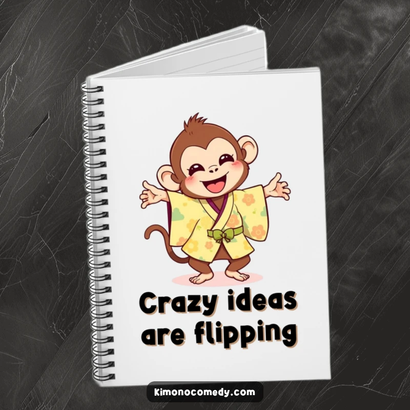 Funny notebook featuring a joyful monkey in a bright kimono doing a silly flip, perfect for note-taking.