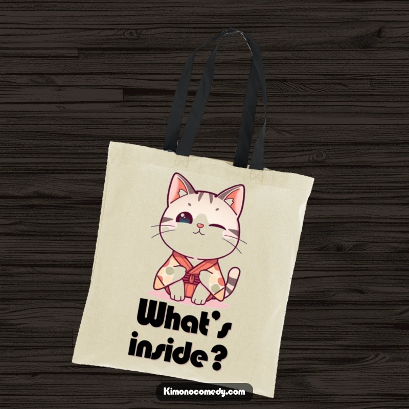 Funny Kawaii cat tote bag, shows a cat in a whimsical kimono tipping its head curiously, durable and humorous accessory.