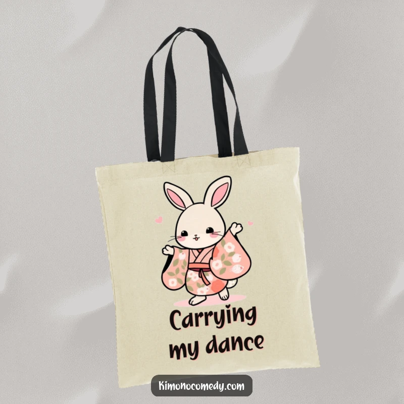 Funny Kawaii rabbit in a floral kimono, dancing gracefully, on this tote bag, making it humorous and stylish.